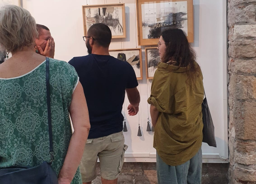 Fotografija 1 - More ljudi obala